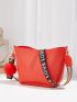 Pebble Embossed Letter Strap Bucket Bag With Pom Pom Charm