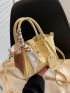 Mini Litchi Embossed Twist Lock Bucket Bag With Bag Charm
