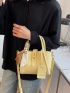 Mini Litchi Embossed Twist Lock Bucket Bag With Bag Charm